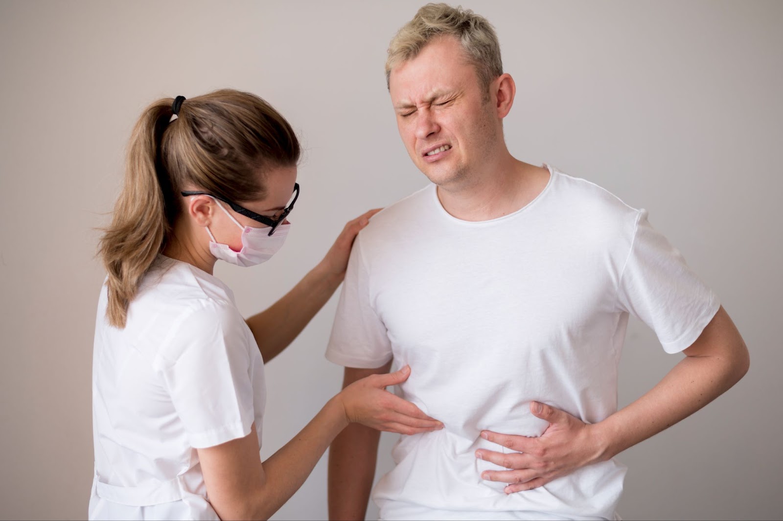 Female doctor checking a man health